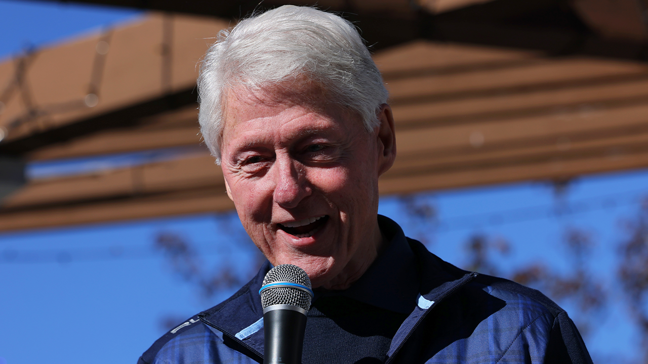 Former president Bill Clinton participates in a New York rally